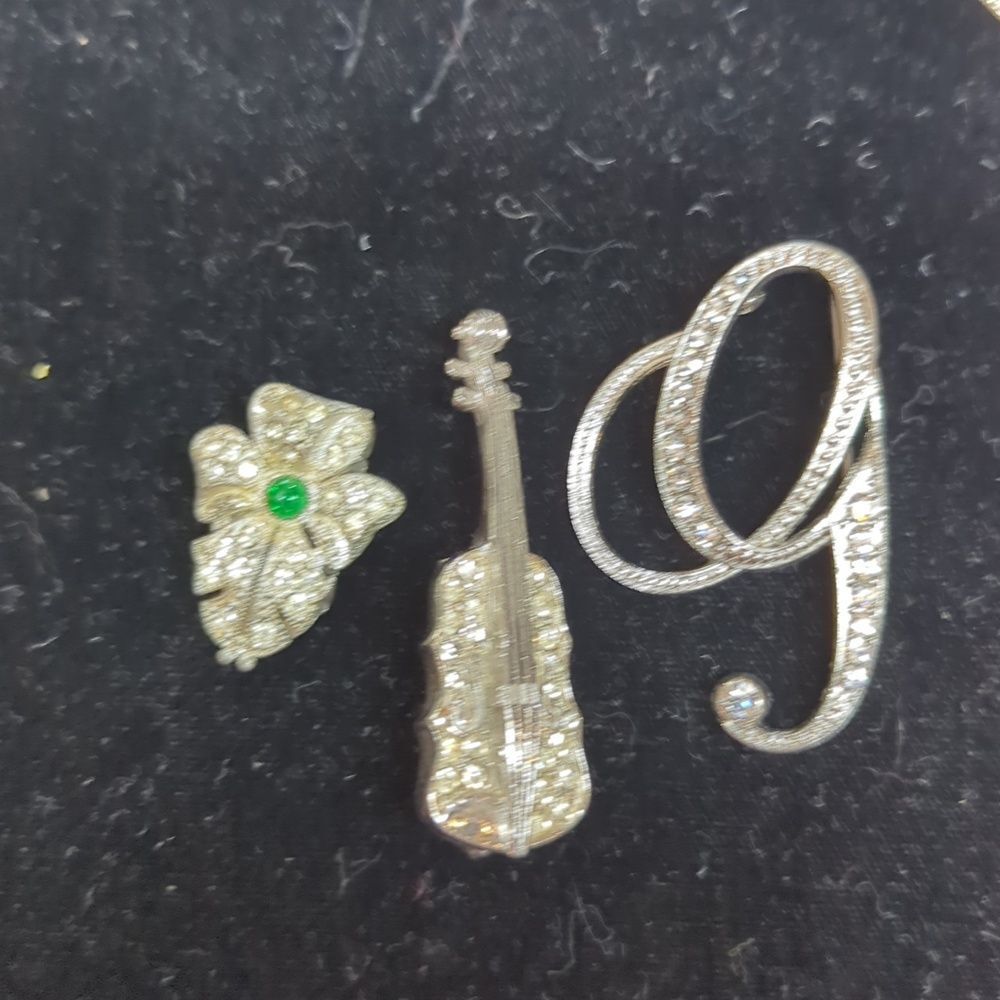 collection of vintage-style rhinestone brooches